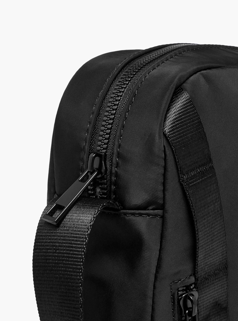 Lee Cooper Logo Print Crossbody Bag with Adjustable Strap and Zip Closure-travel-accessories-image-6