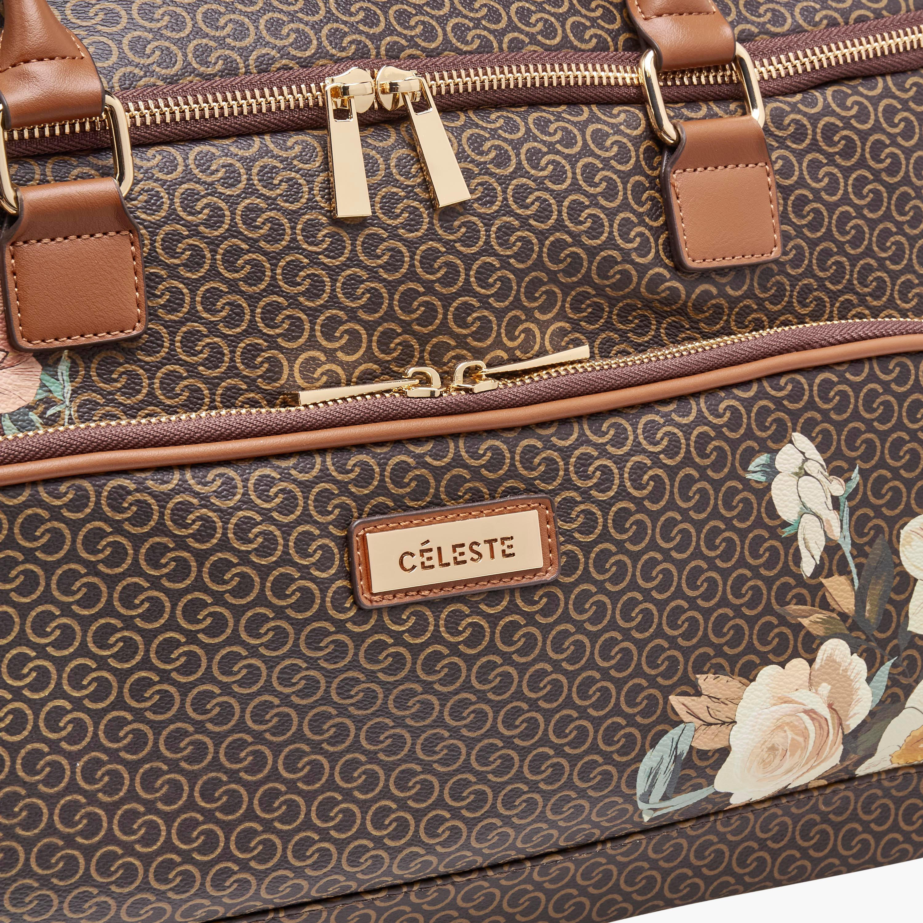 شنطة دافل بطبعات مونوجرام وبمقبض قابل للسحب من سيليست-travel-luggagesandbags-dufflebags-image-6