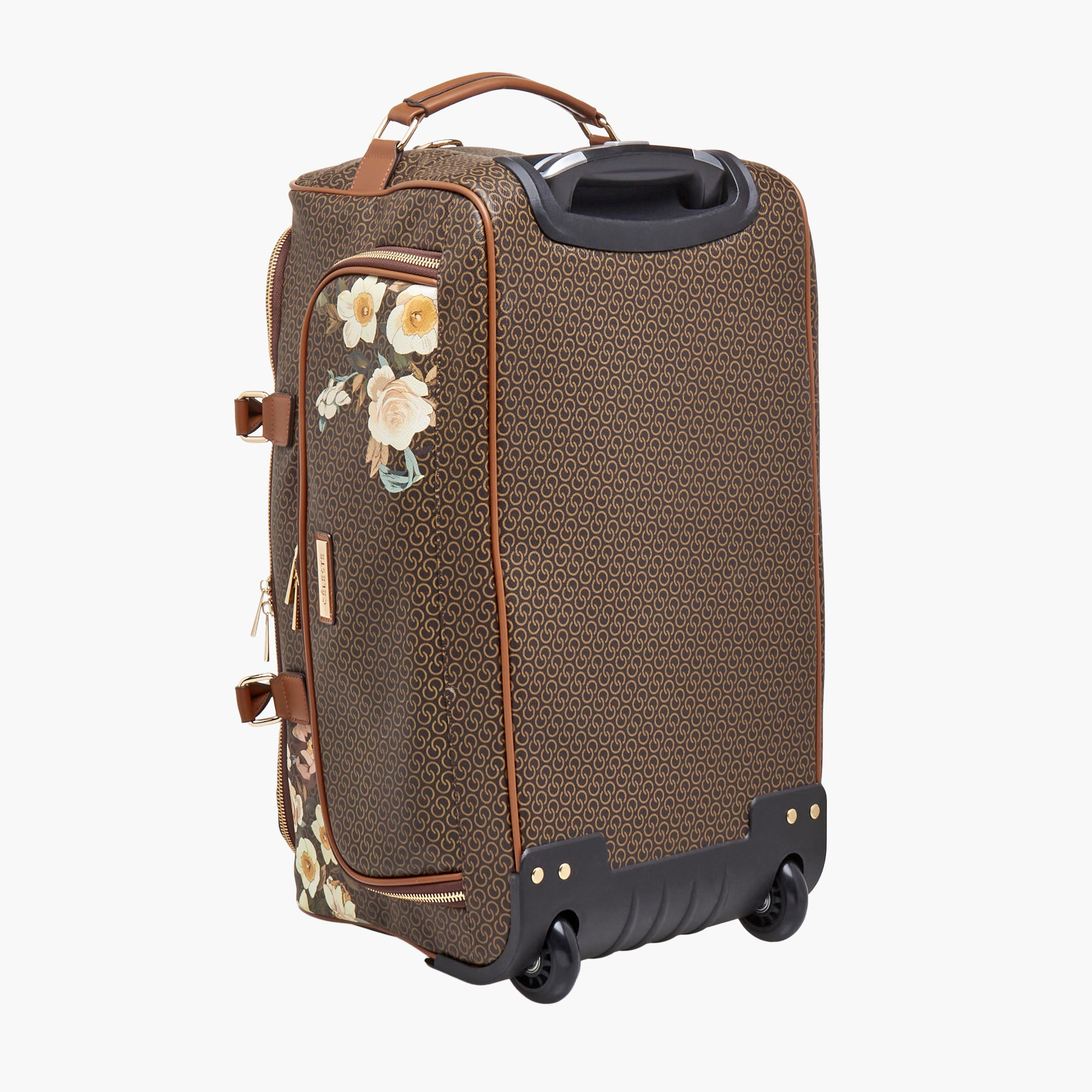 شنطة دافل بطبعات مونوجرام وبمقبض قابل للسحب من سيليست-travel-luggagesandbags-dufflebags-image-8