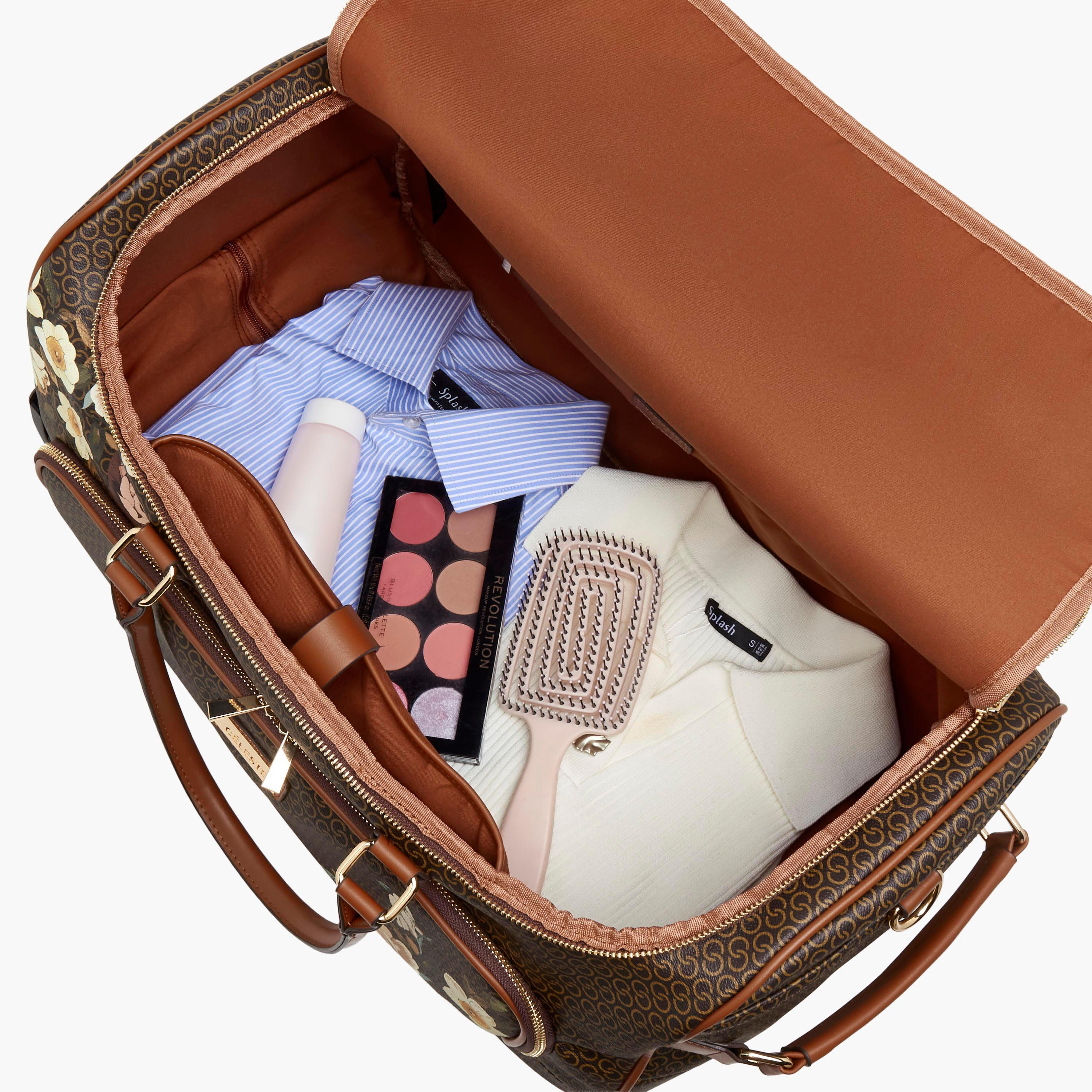 شنطة دافل بطبعات مونوجرام وبمقبض قابل للسحب من سيليست-travel-luggagesandbags-dufflebags-image-9