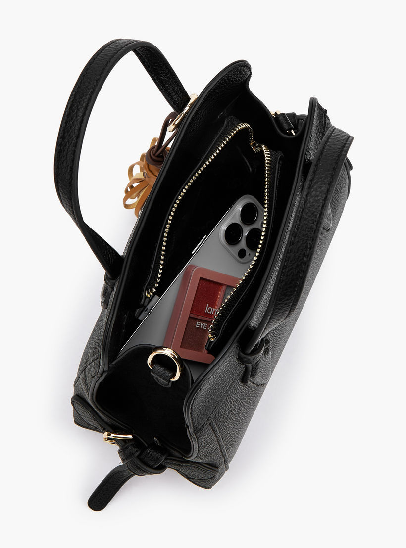 شنطة كروس بودي بارزة الملمس بتفاصيل شرابة من سيليست-women-bagsandwallets-handbags-image-7