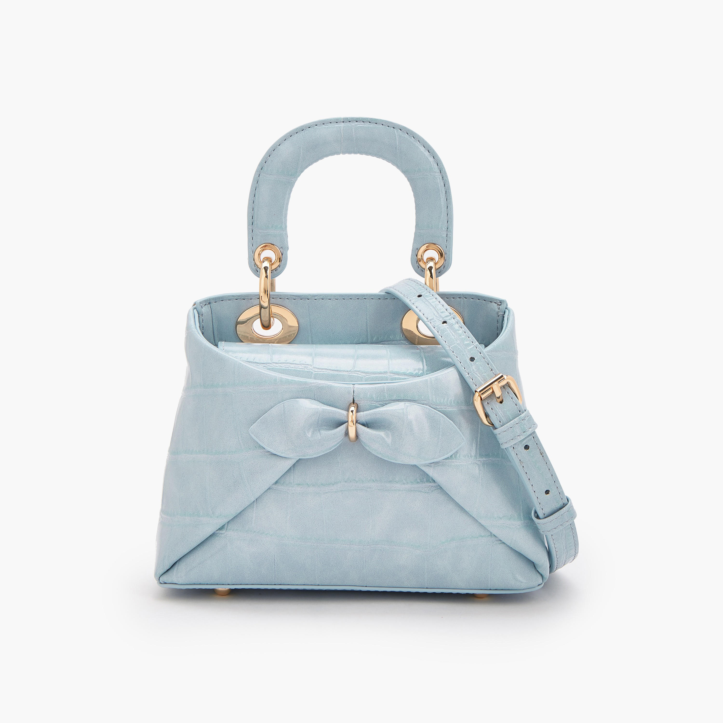 شنطة كروس بودي بزينة فيونكة ومقبض علوي من سيليست-women-bagsandwallets-handbags-image-1