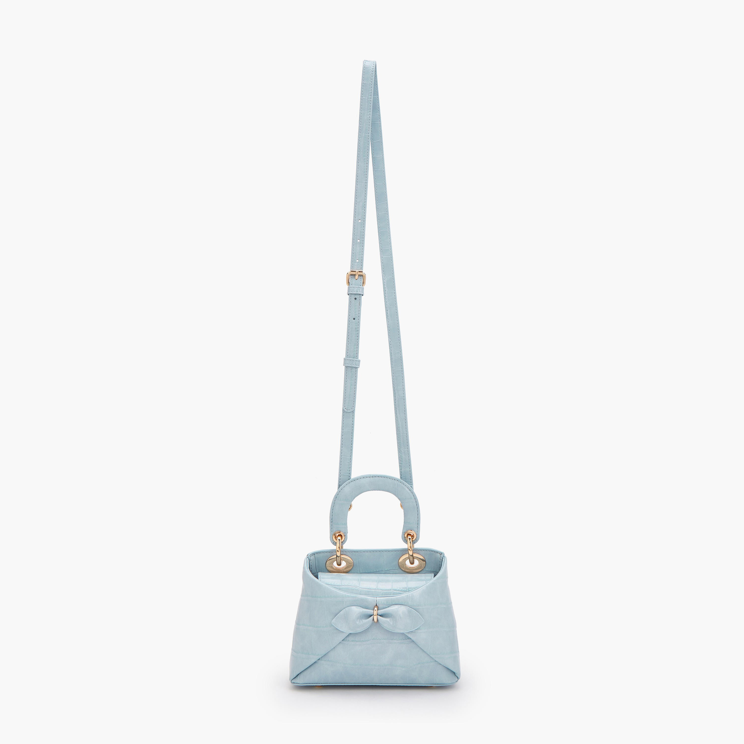 شنطة كروس بودي بزينة فيونكة ومقبض علوي من سيليست-women-bagsandwallets-handbags-image-2