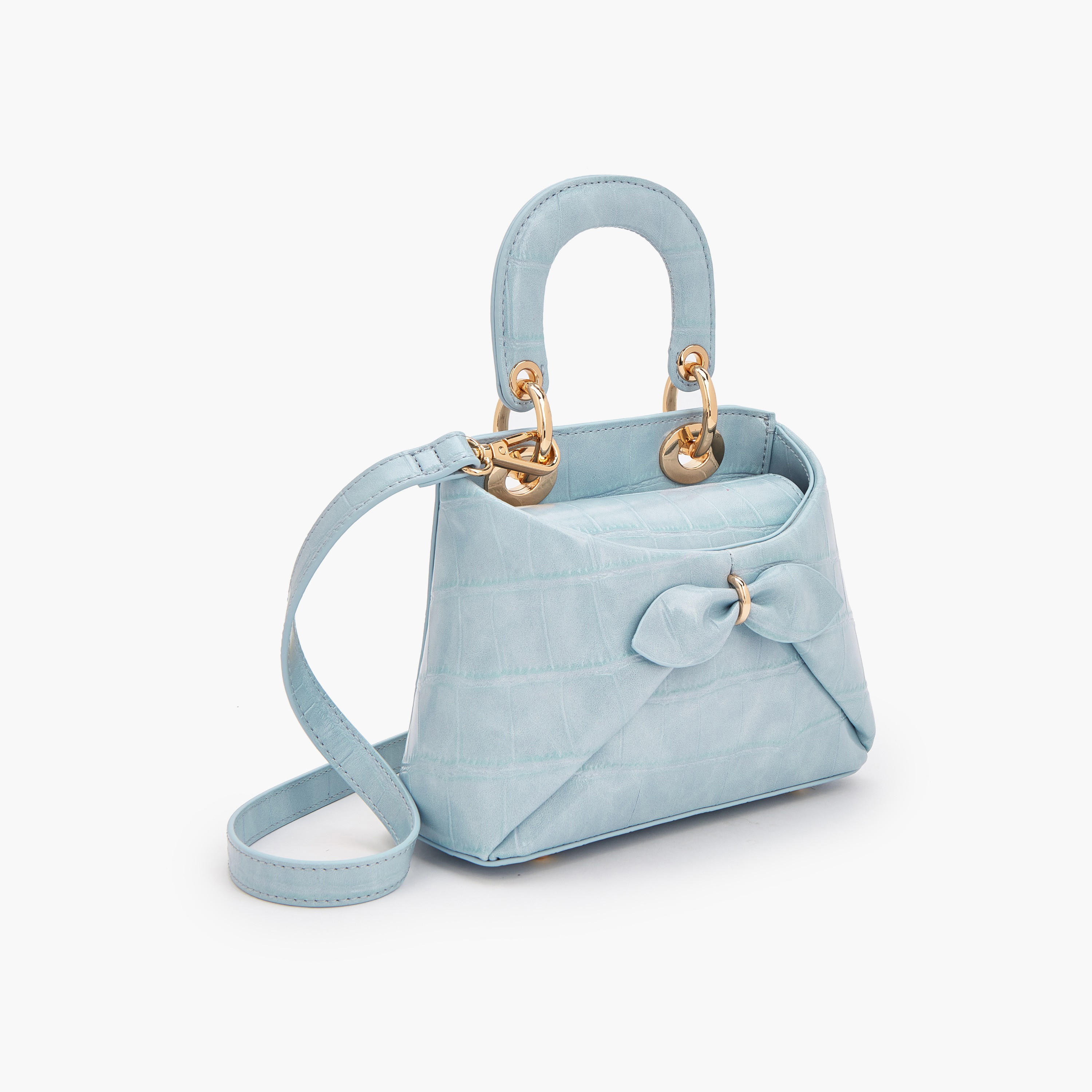 شنطة كروس بودي بزينة فيونكة ومقبض علوي من سيليست-women-bagsandwallets-handbags-image-3
