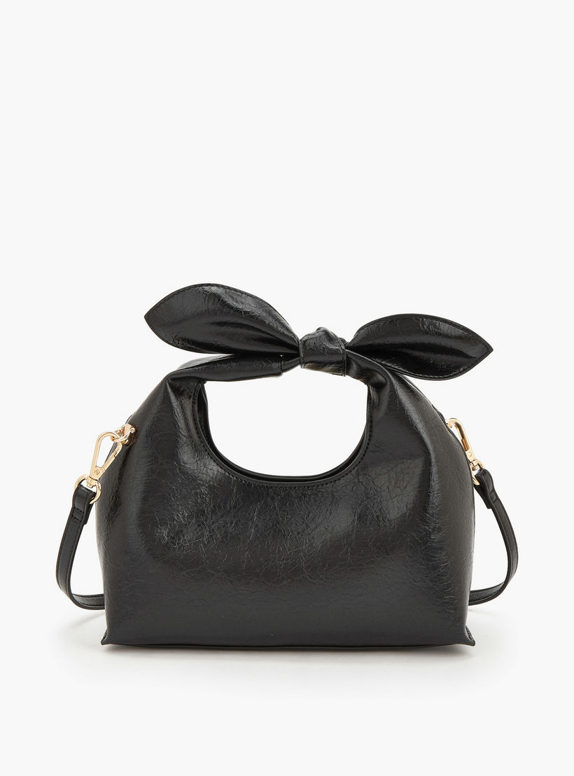 شنطة كروسبودي بتفاصيل فيونكة وبحزام قابل للفصل من سيليست-women-bagsandwallets-handbags-image-5