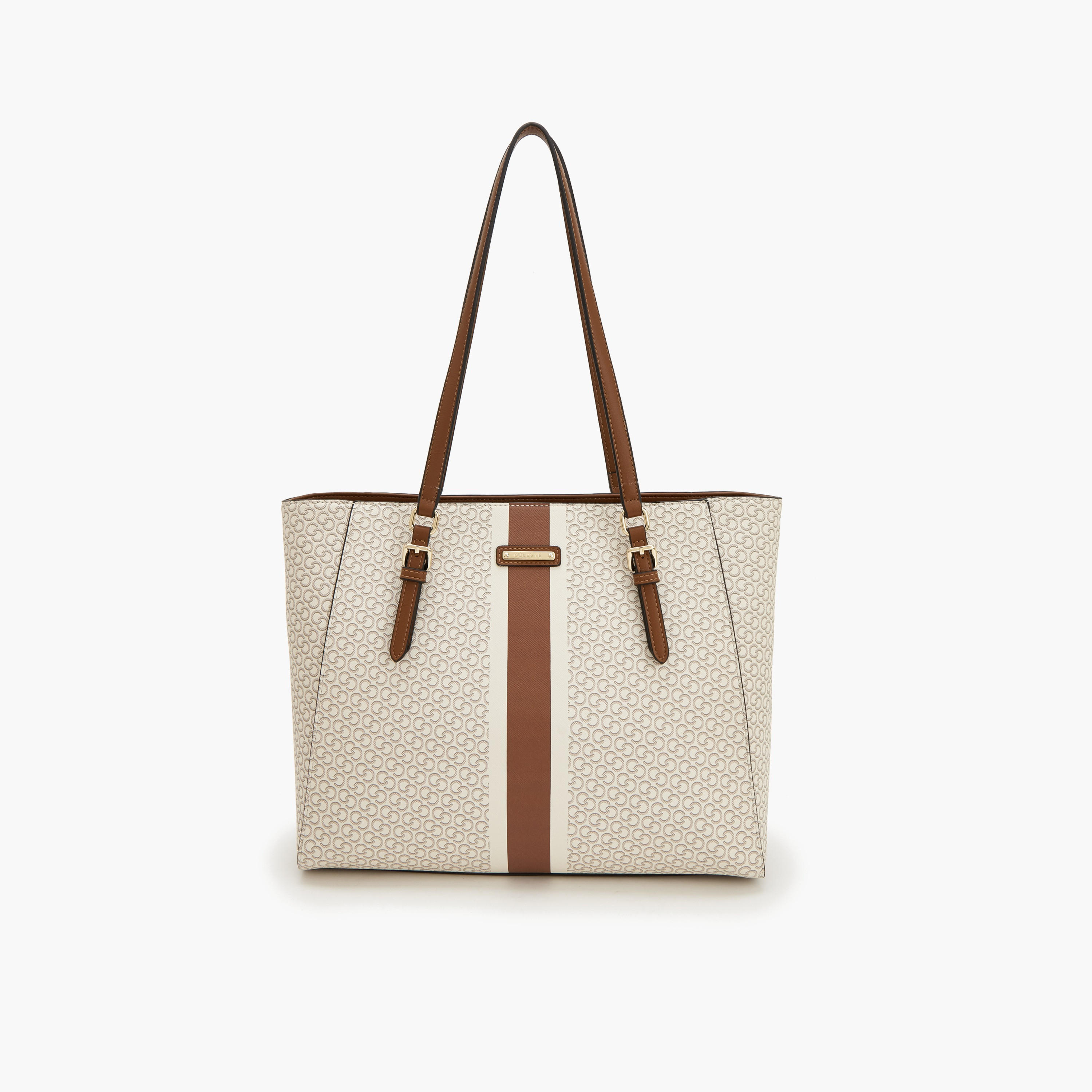 شنطة توتي بسحاب إغلاق وطبعات مونوجرام من سيليست-women-bagsandwallets-handbags-image-1