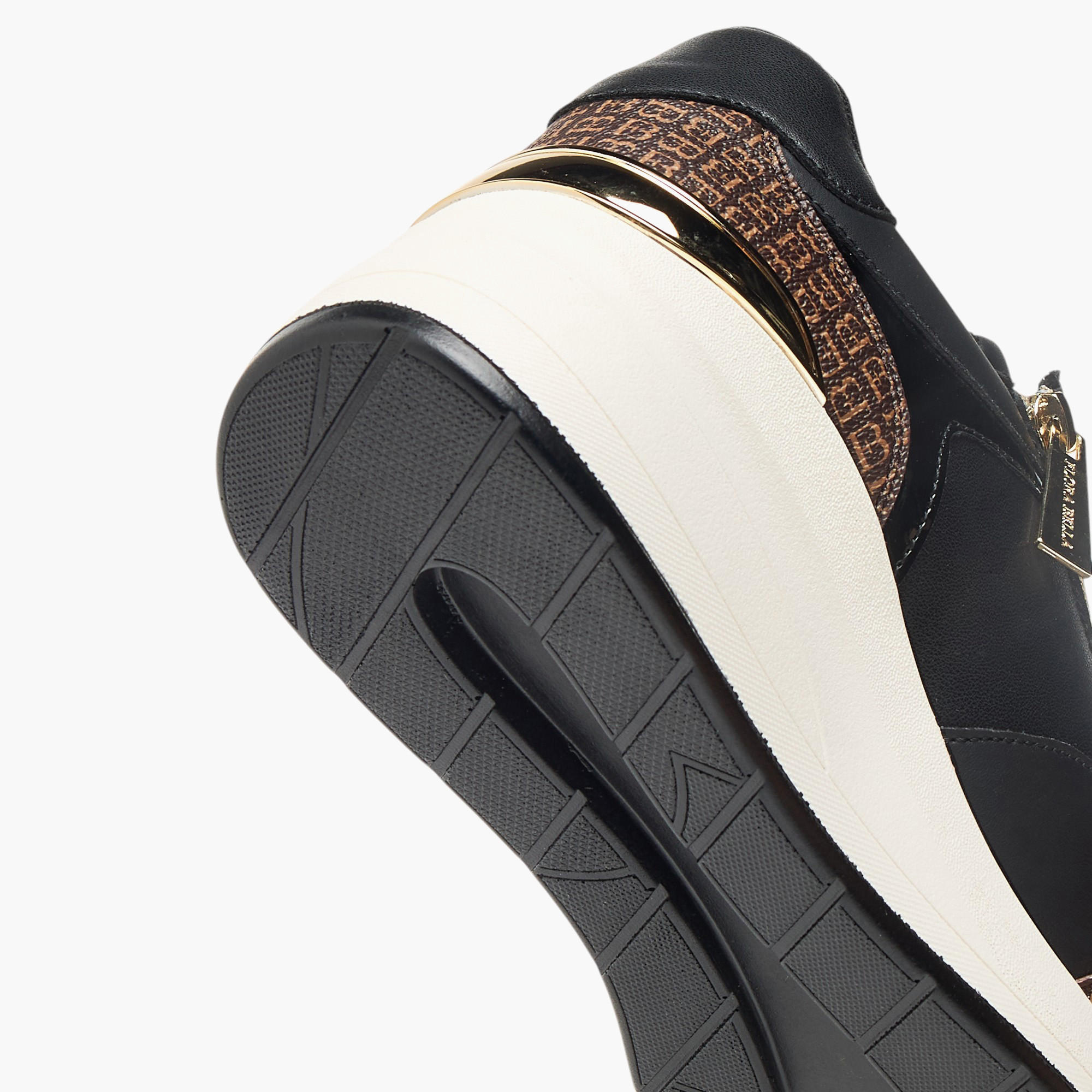 حذاء سنيكرز بطبعات مونوجرام ورباط إغلاق من فلورا بيلا-women-shoes-sneakers-image-5