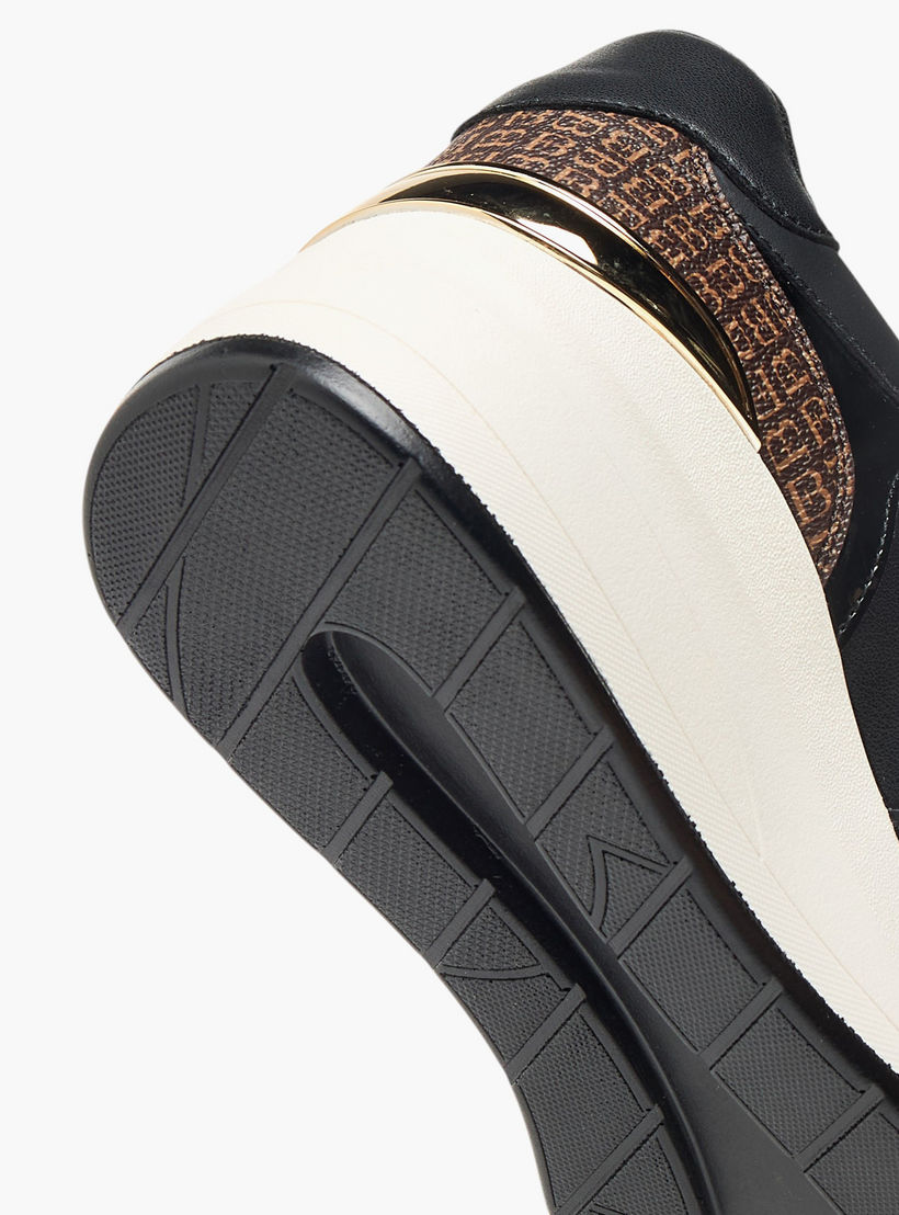 حذاء سنيكرز بطبعات مونوجرام ورباط إغلاق من فلورا بيلا-women-shoes-sneakers-image-5