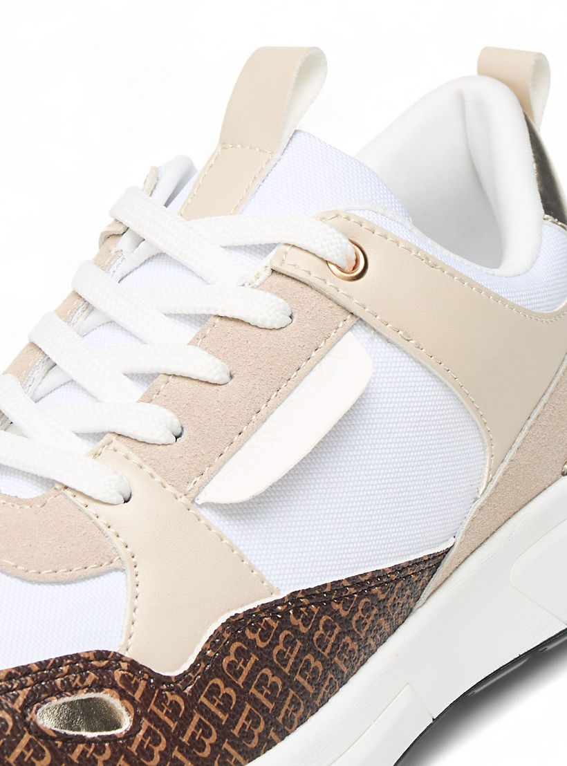 حذاء سنيكرز بطبعات مونوجرام ورباط إغلاق من فلورا بيلا-women-shoes-sneakers-image-5